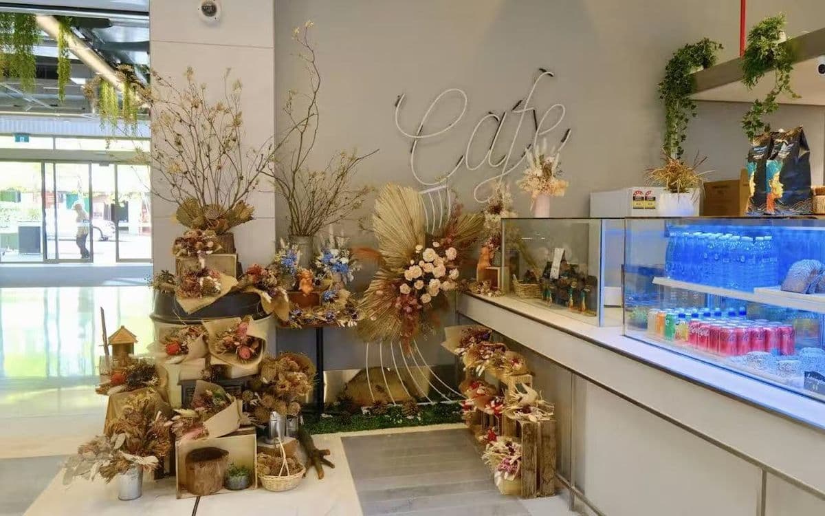 Wonder by Alice café — floral display and beverage counter